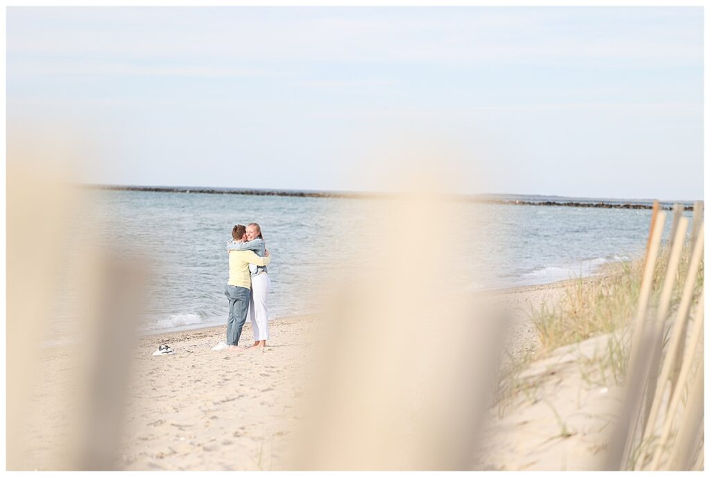 Artistic portrait of newly engaged couple at Steps Beach in Nantucket.