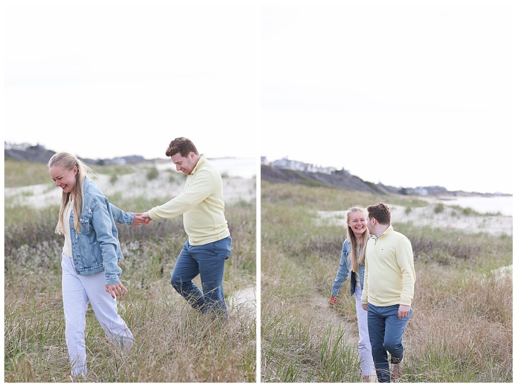 Couple walks through sea grass in Nantucket at Steps beach after he proposed to her.
