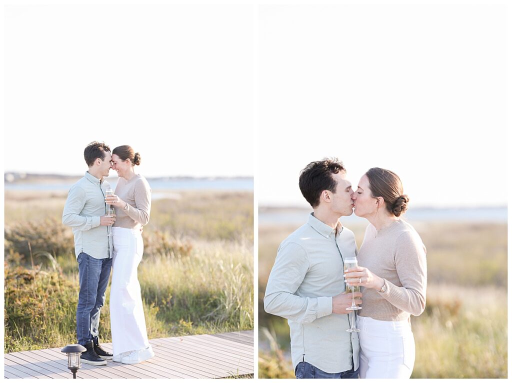 Nantucket newly engaged couple kiss at The Wauwinet during engagement pictures by Melissa Lacasse Photography.