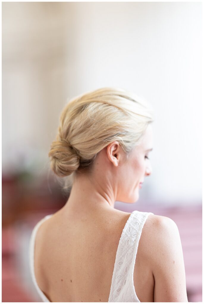 Bridal updo hair style during bridal portraits at Nantucket wedding.