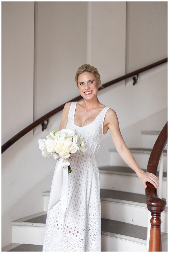 Bride on the stairwell of the Nantucket Unitarian Church for Nantucket wedding.