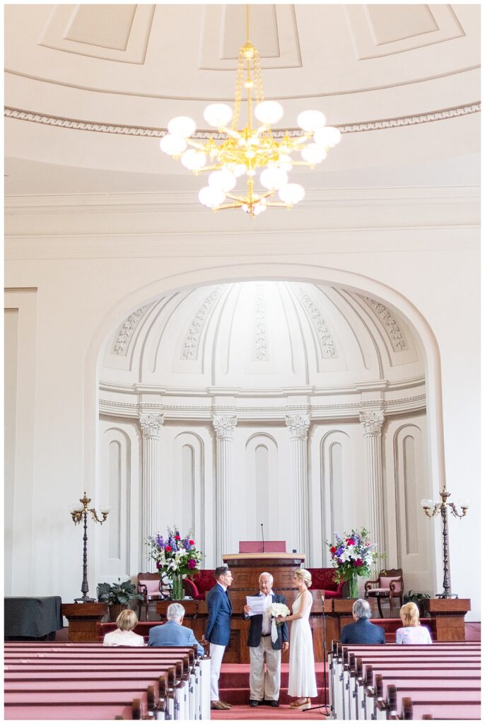 Nantucket wedding at the Unitarian Church of Nantucket. Ceremony with bride and groom saying vows.