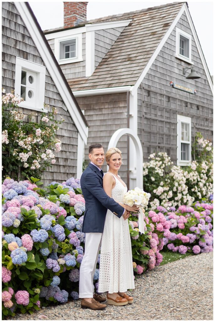 Bride and Groom in Nantucket at the Old North Wharf after their Nantucket wedding.