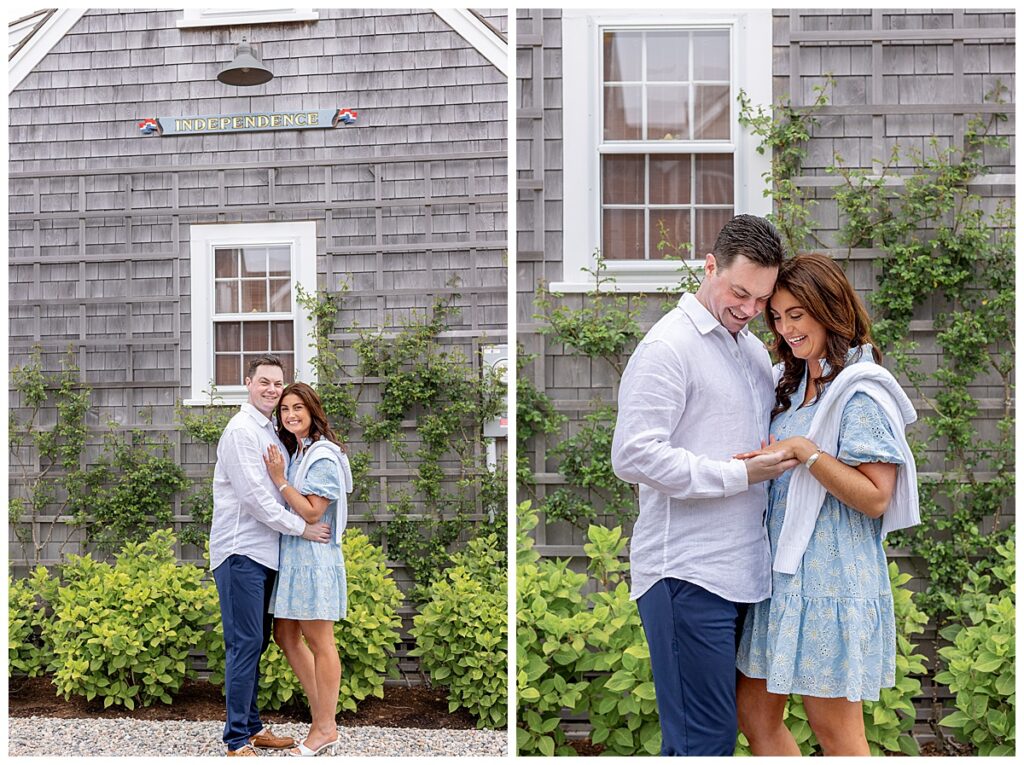 Couple admire the new ring on the fiances finger as they stroll along the Old North Wharf in Nantucket during engagement pictures.