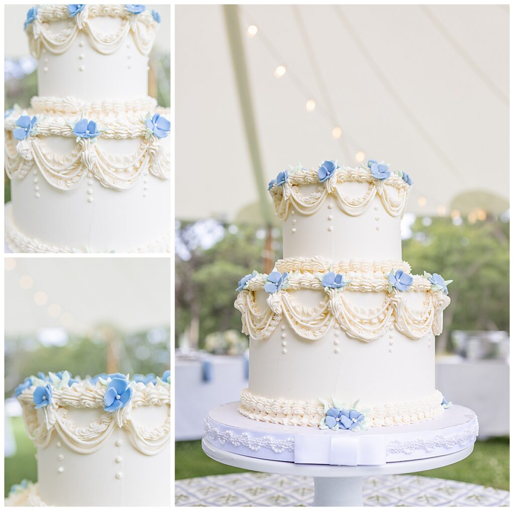 Beautiful cream and baby blue wedding cake sitting on a table under a tent at a Chatham, Cape Cod wedding.