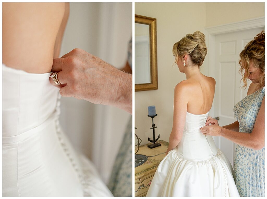 Mother helps button the wedding dress for her daughter at her Chatham, Cape Cod wedding.
