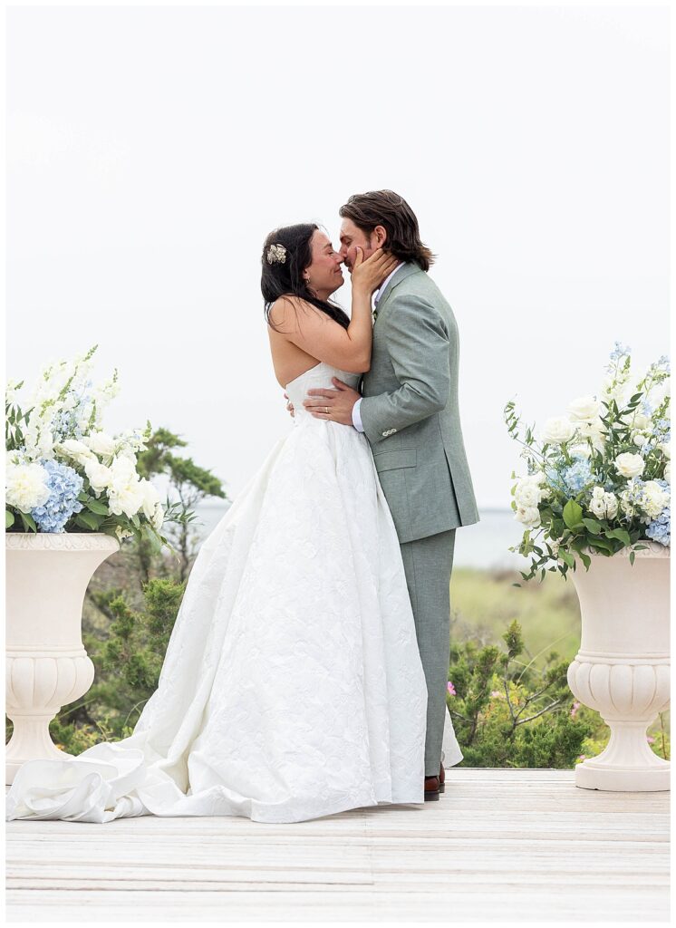 Bride and Groom about to kiss on their wedding day on the Zen Deck at The Wauwinet in Nantucket.