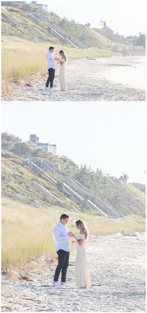 Man slides ring on woman's finger while they are both standing after his Nantucket Proposal at Steps Beach over Labor Day weekend.