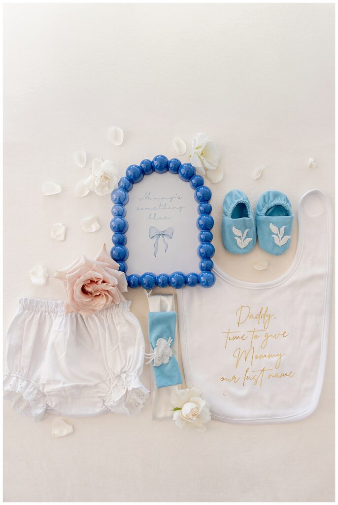 Baby wedding details for her mom and dads wedding at The Lakehouse, a Sapphire Event Group venue in Halifax, Cape Cod, Massachusetts.